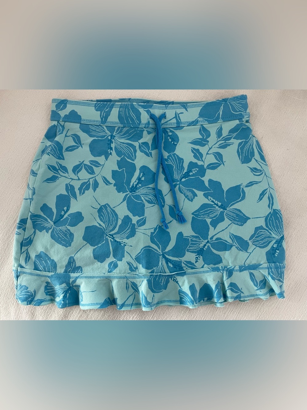 Express Light Blue Floral Drawstring Mini Skirt with Ruffle Hem